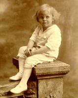 Rawley, my father, as a child in front of his Greenwich Village home around 1918.